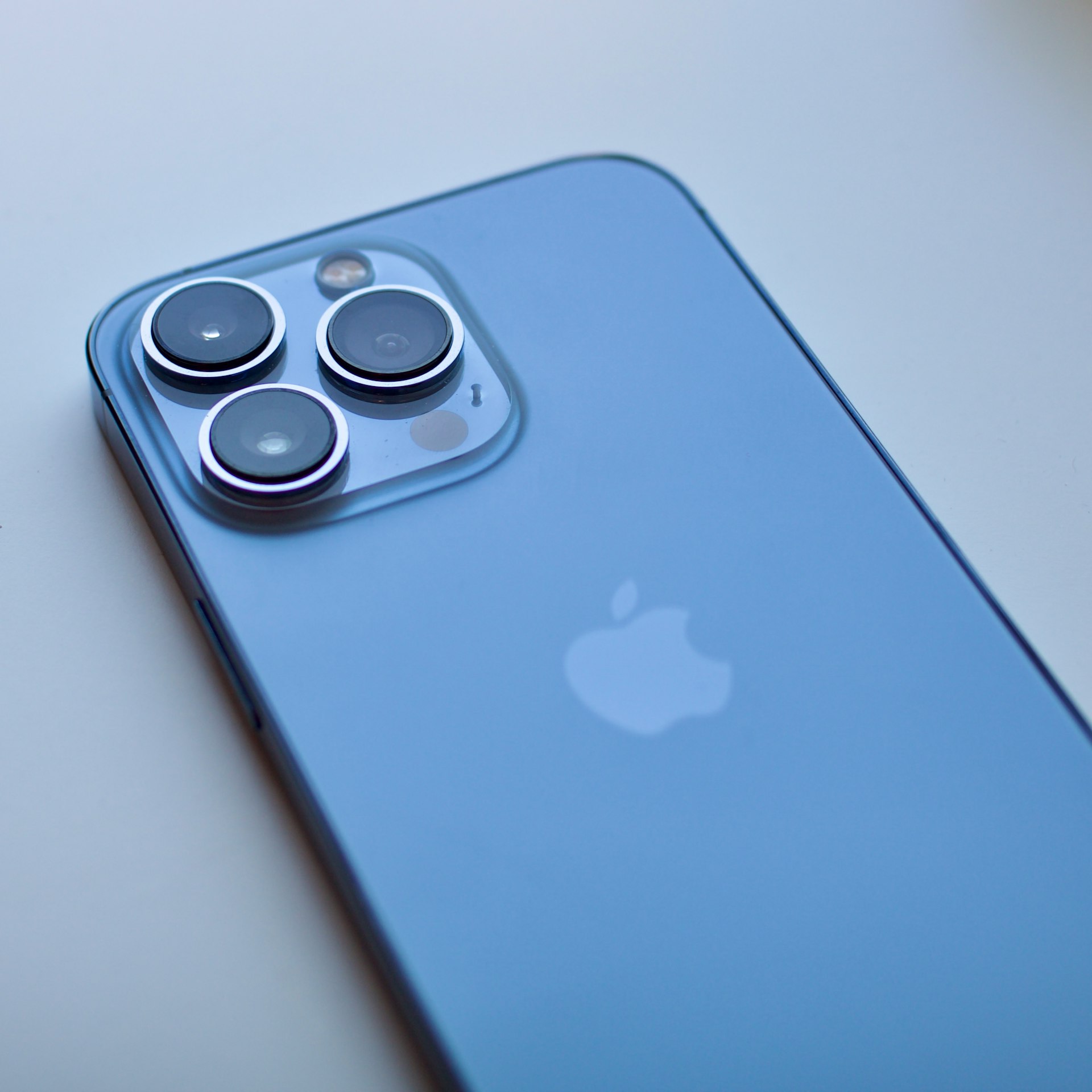 a close up of a cell phone on a table